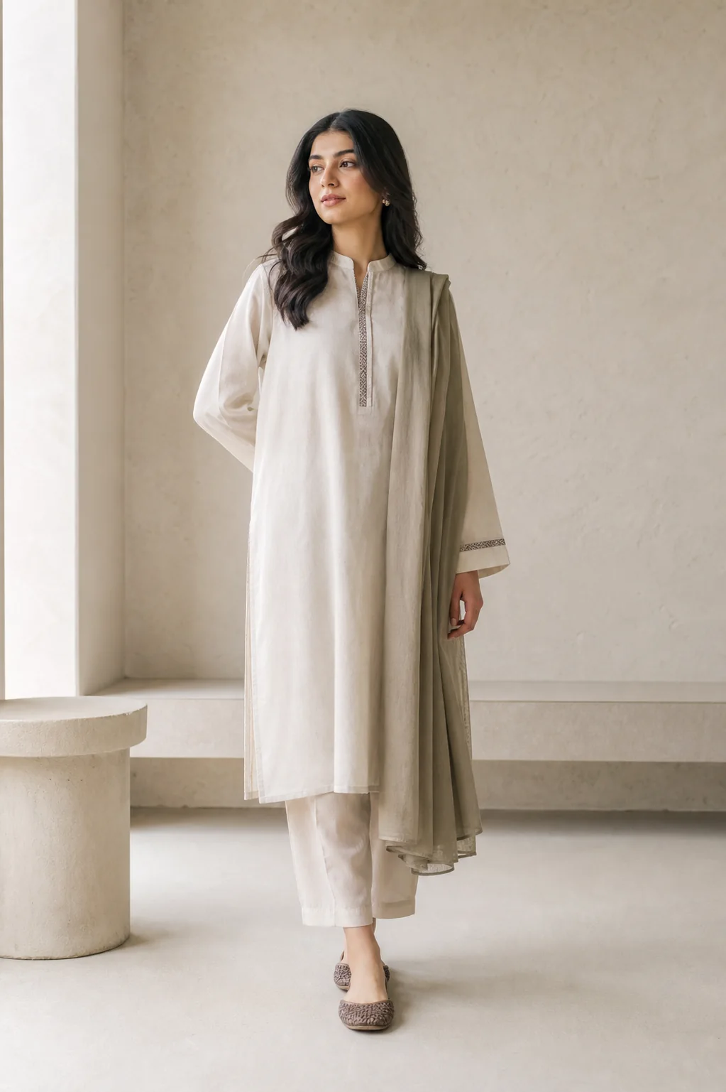 Adult woman in a modern modest everyday outfit inspired by Pakistani fusion fashion.